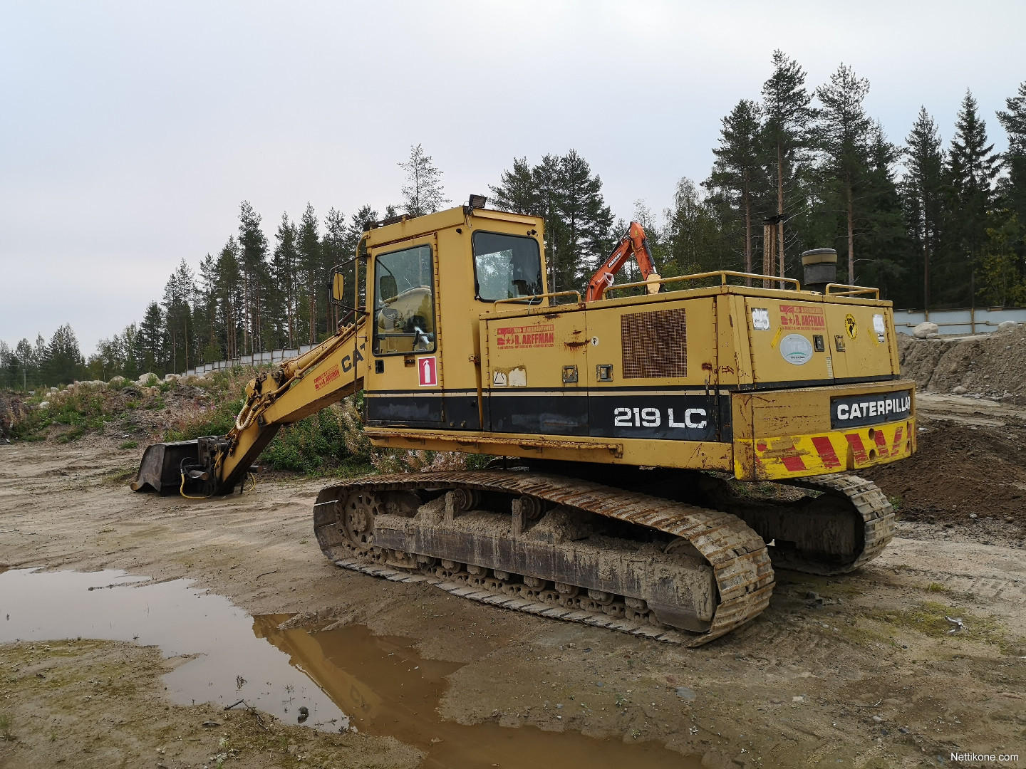 Caterpillar 219 LC kaivinkone, 1990 - Nettikone