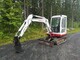 Takeuchi Tb125 kumitela kaivinkone. kallistuva liitin