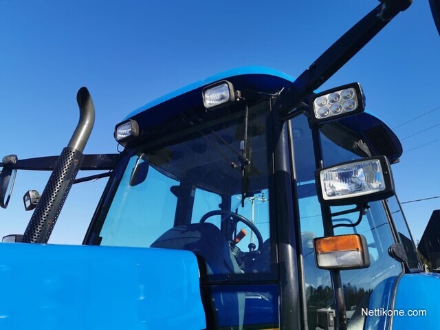 New Holland TM 120 Etunostolaitteilla traktorit, 2005 - Nettikone