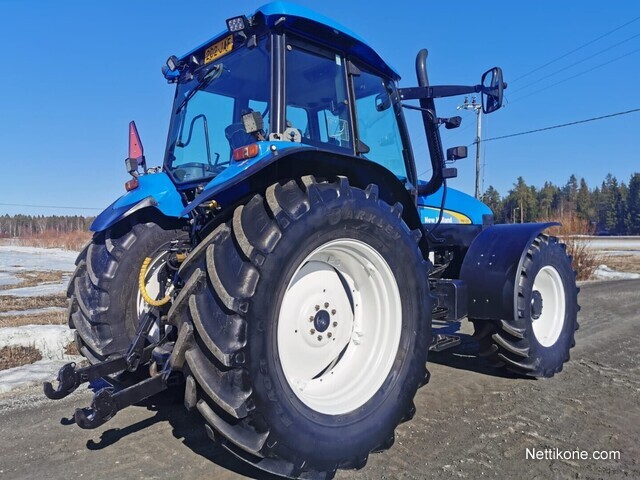 New Holland TM 120 Etunostolaitteilla traktorit, 2005 - Nettikone
